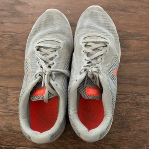 Nike Revolution 3 shoes in orange and gray, size 9